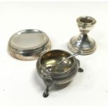 Silver h/m dwarf candlestick, silver mustard and small silver dish.