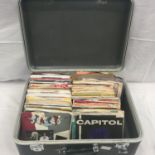 BOX OF VARIOUS 7" SINGLES. This metal box contains many hit singles and various EP's from across the