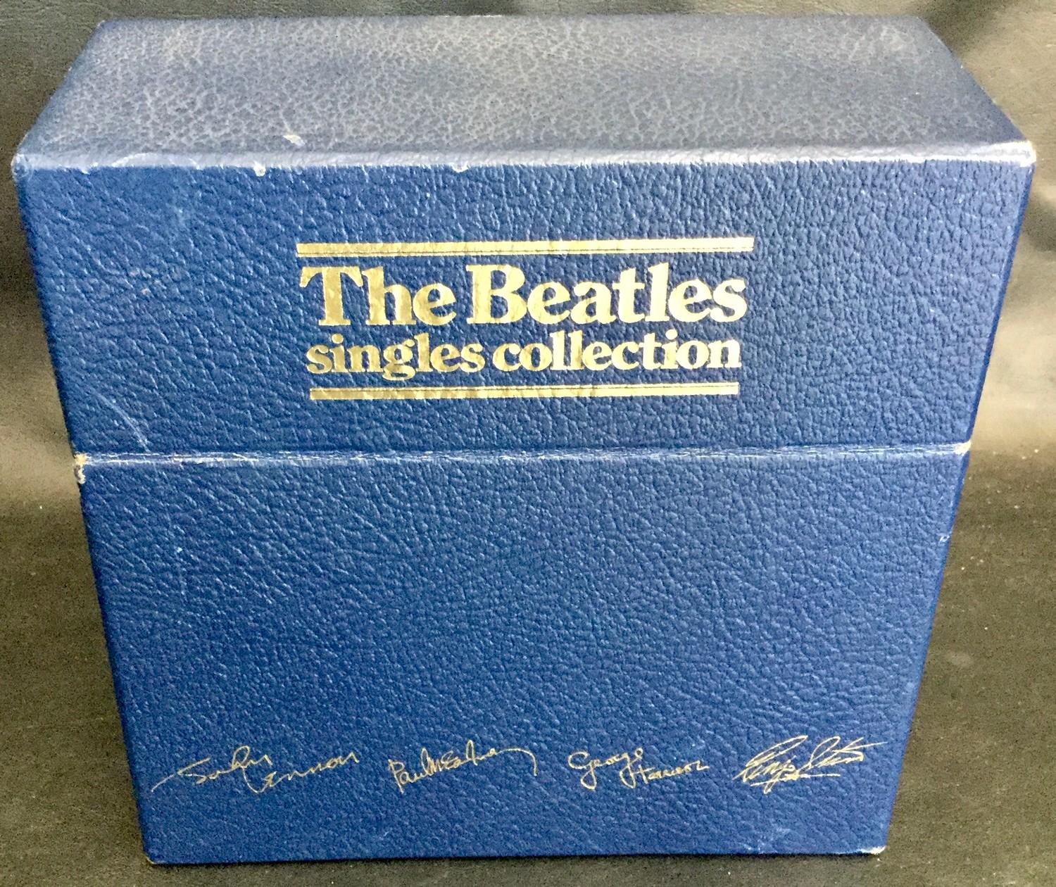 THE BEATLES 7" SINGLES COLLECTION BOX SET. This is the Beatles box set with 26 singles on Parlophone