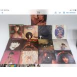 KATE BUSH VINYL COLLECTION OF 7" SINGLES. 13 in total here with a rare copy of 'Moving' also