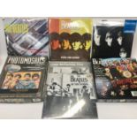 BEATLES PUZZLES AND CALENDARS. 2 puzzles in this lot along with 4 sealed Beatles calendars from