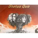 STATUS QUO SIGNED VINYL ALBUM. Clearly signed in biro by all four members of the classic line-up