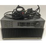 QUAD 405 AMPLIFIER AND QUAD 34 CONTROL UNIT. The power amplifier delivers 100 watts per channel
