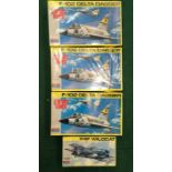 Four model kits by Monogram to include F4F Wildcat, F-102 Delta Dagger and others. All seem complete