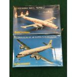 Two model kits by Heller Humbrol to include Douglas DC-6B Super-Cloudmaster and Lockheed 1049 G. "