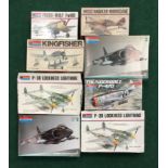 Eight model kits by Monogram to include Focke-Wulf Fw190, Kingfisher and others. All seem complete