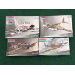 Four model kits by Monogram to include Spitfire Mk.II, Hawker Typhoon and others. All seem