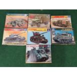 Seven model kits by Italeri to include Ambulance, Panzer IV and others. All seem complete but not