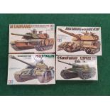 Four model kits by Tamiya to include Kampfpanzer Leopard. All seem complete but not checked.