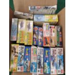 Box containing Nineteen small model kits from various manufacturers to include Revell, Airfix and