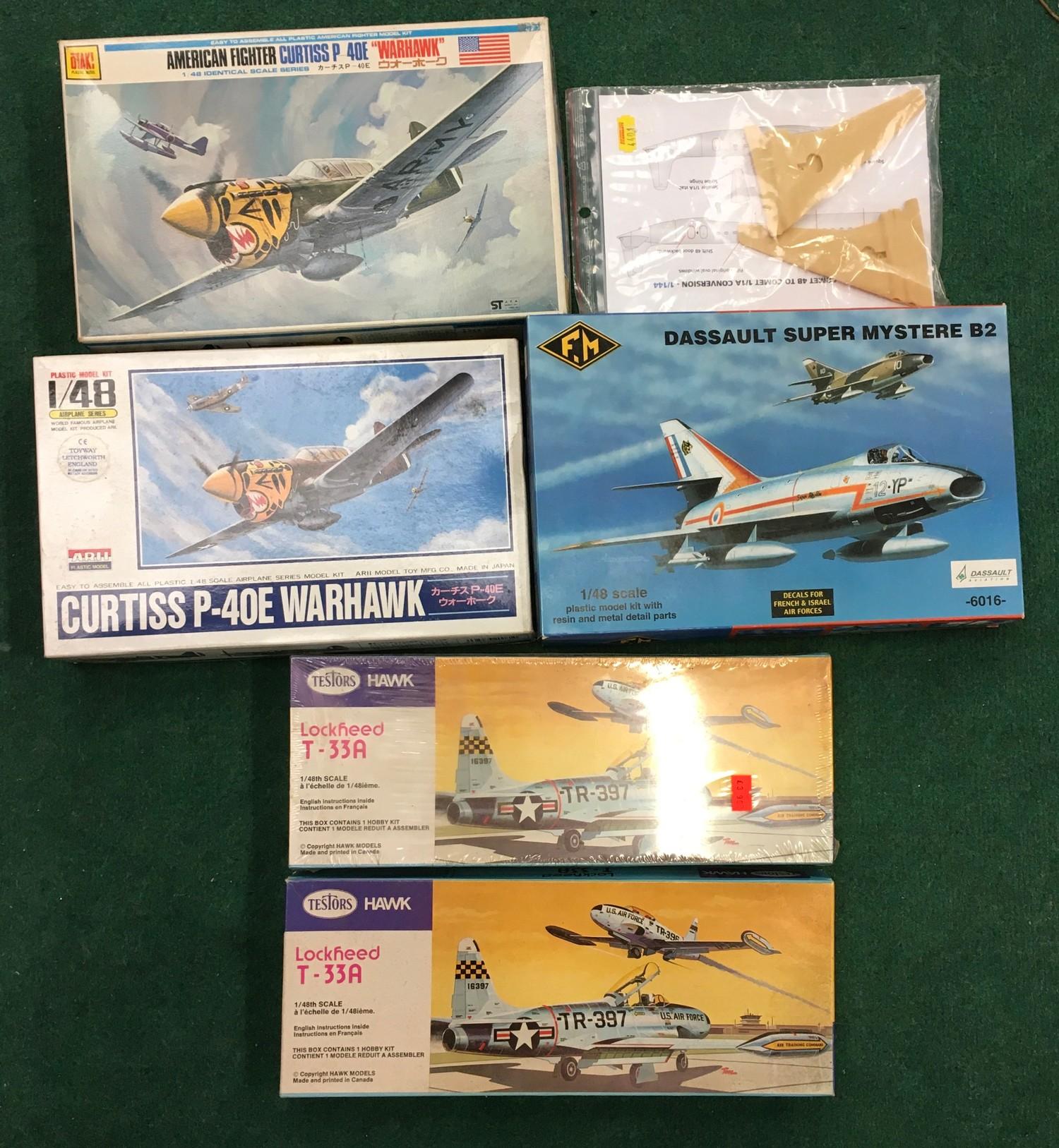 Five model kits to include F.M, Testors, ARII and others. All seem complete but not checked.