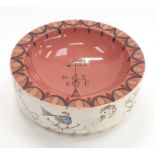 Poole Pottery twintone ashtray in Red Indian colourway with unusual handpainted decoration.