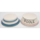 Poole Pottery studio shop display stands one with advertising logo on the front 7.8" dia. (2)