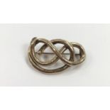 9ct gold brooch. (8.2g).