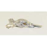 A silver plated clip in form of a duck.
