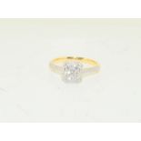 An 18ct yellow gold Diamond cluster ring of 60 points. Size O.