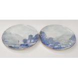 Two large blue and white wall chargers oriental scenes.