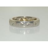 A 9ct white gold Cartier style love ring, Size M.