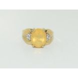 9ct gold Ethiopian opal ring. Size N+.