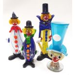 Collection of four Murano glass clown figures.