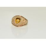A 14ct gold gents collegate Colombian high school tiger eye ring, size P.