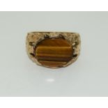 A 9ct gold Tigers eye ring, Size Q.