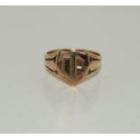 A 9ct gold gents shield ring, 5.9g, Size V.