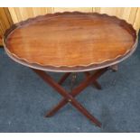 Mahogany butlers tray on stand.