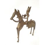 Bronze Egyptian statue of a man on horseback.