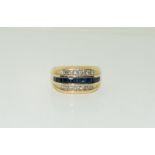 14ct gold mans sygnet ring with diamonds a sapphire banding, size Z.