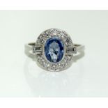 Platinum ladies sapphire and diamond ring. Size N.