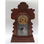 An American oak cased bracket clock by the Ansonia Clock Co. New York.