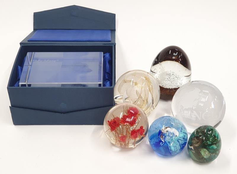 A collection of paperweights to include the Caithness outlets Elliotts stone from Israel and the