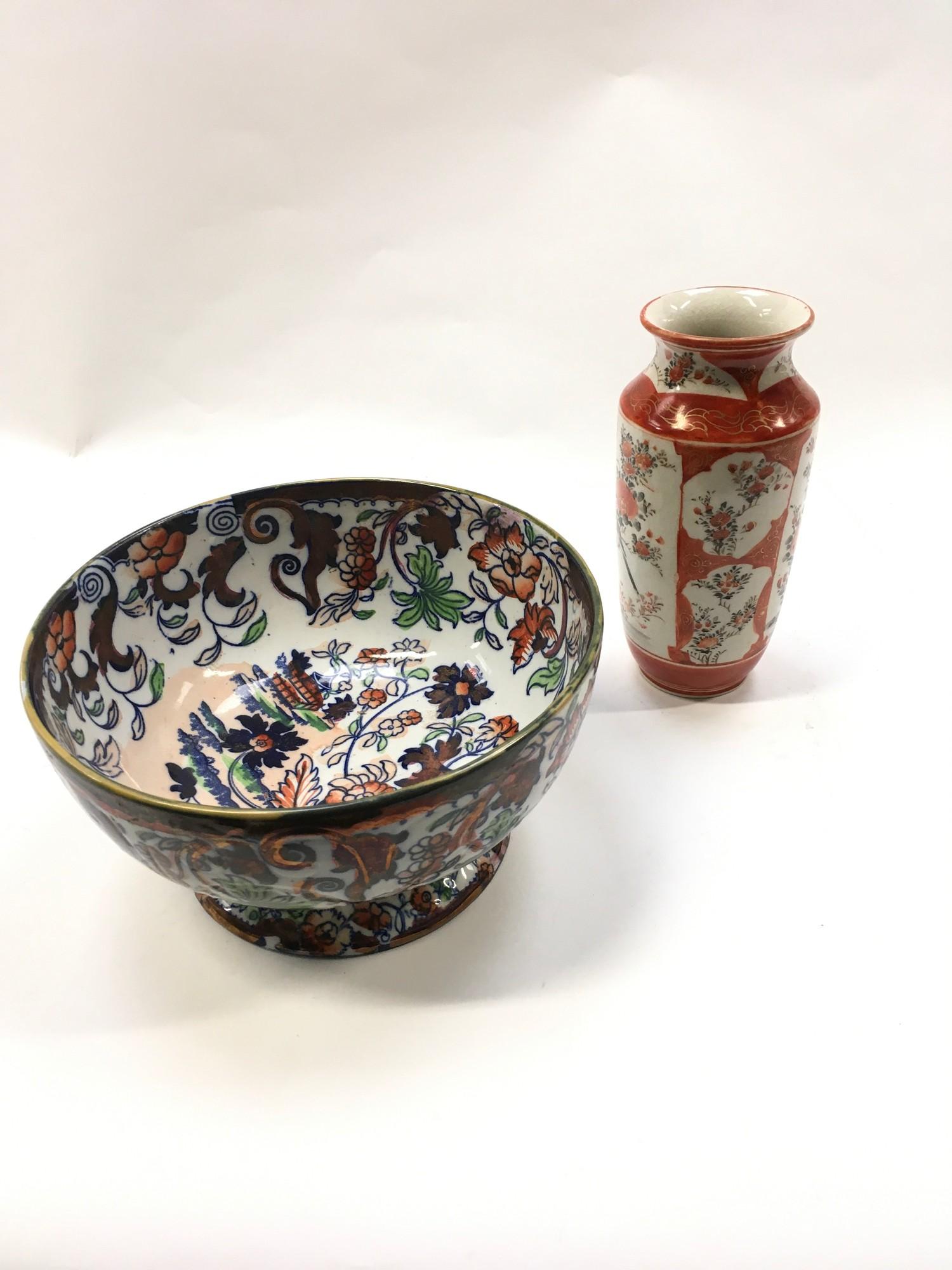 An Oriental bowl together with an Oriental vase.