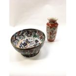 An Oriental bowl together with an Oriental vase.