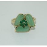 A 9ct gold and emerald heavy fancy ring. Size M.
