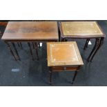 Nest of two mahogany tables with leather tops together with a nest of three mahogany tables and