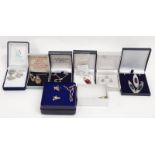 Eight boxes containing assorted silver jewellery.