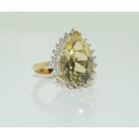 A 9ct gold pear shaped antique set diamond and citrine ring, Size N.