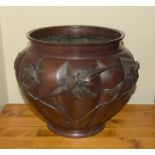 Oriental bronze bowl (jardiniere) with bird decoration. 22 x 23cm.