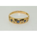 An 18ct gold diamond and Sapphire antique set gypsy ring, Size R.
