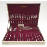 Boxed noritake silver-plated cutlery set for 6 place settings.