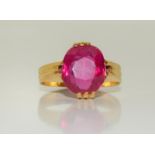 A 22ct yellow gold tested single faceted Ruby Ring of 3cts Approx. Size L.