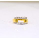 An 18ct gold ladies Diamond open face ring (tested) Size M.
