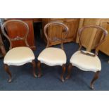 Three Victorian mahogany balloon back dining chairs (one af).