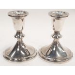 Pair of silver sterling dwarf candle sticks.