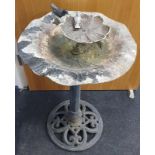 A vintage cast bird bath.