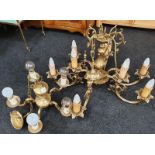 Two brass chandelier broom lamps.