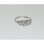 Platinum three stone ring. Size S.