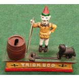 Cast painted "Trick Dog" money box.